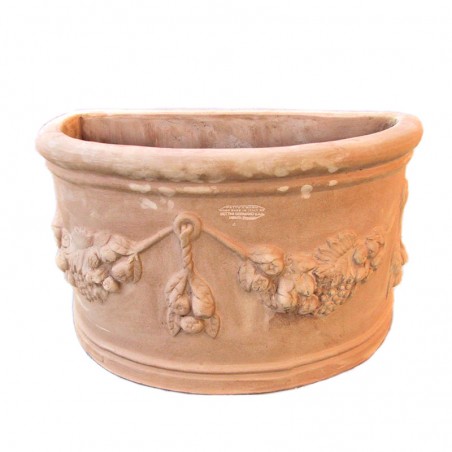 Wall vase in terracotta with festoons hand made